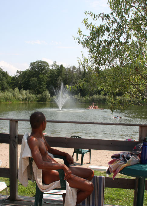 relaxing on the Outback deck by the lake
