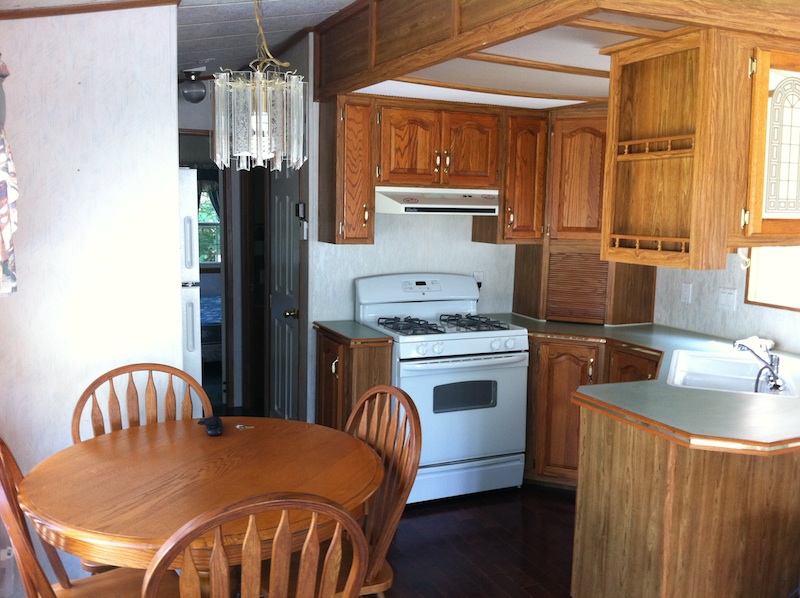 Kitchen in the rental trailer / cabin at Bare Oaks Family Naturist Park