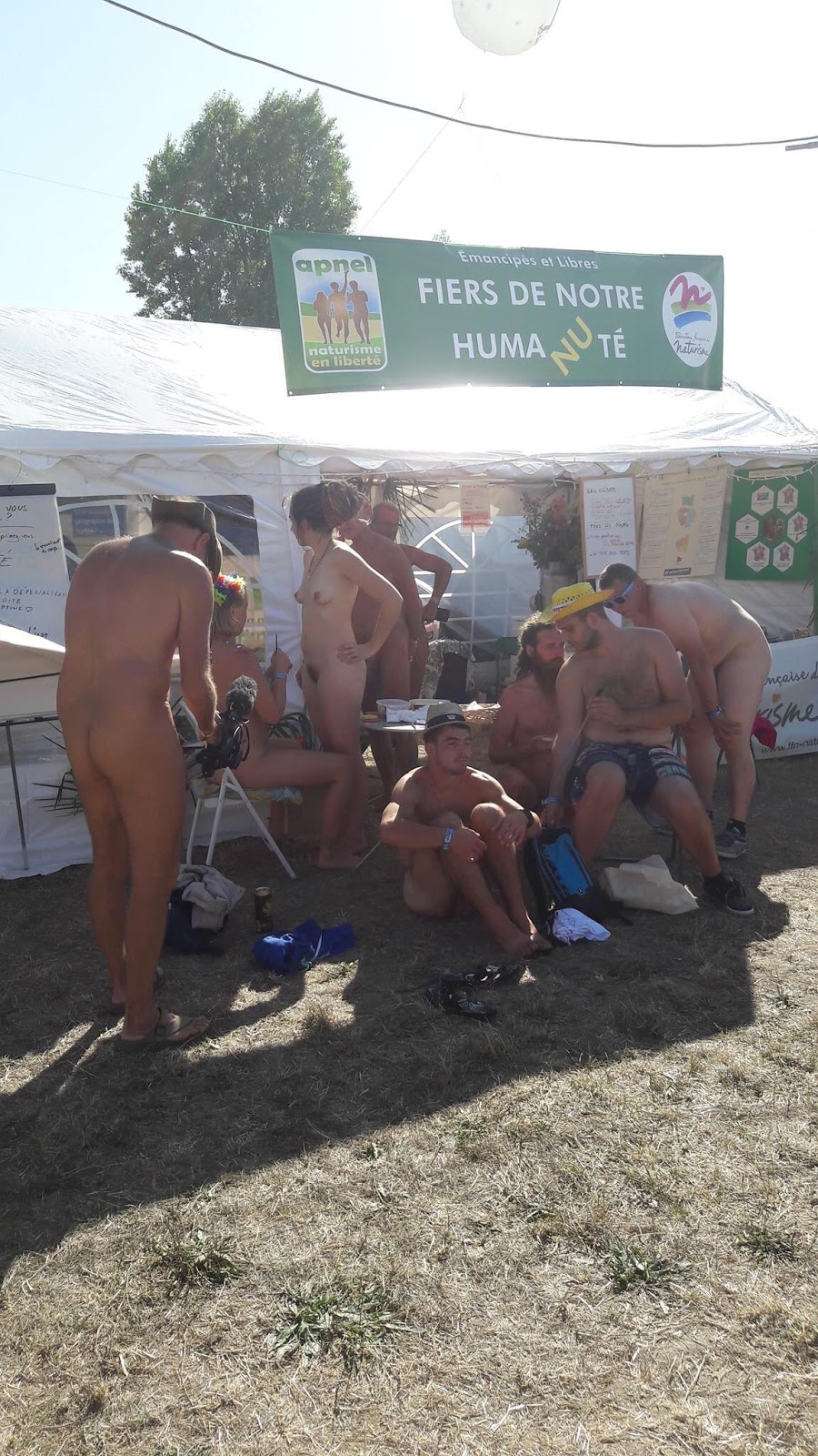nude naturists at an exhibition in Paris, France